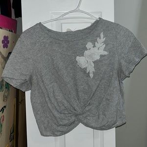 Grey garage crop top with white floral design